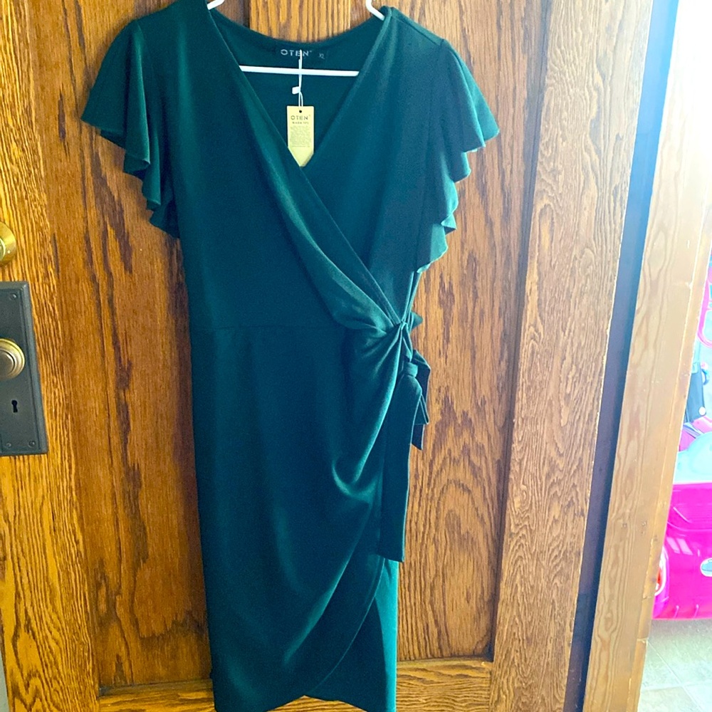 Hunter green wrap dress, body con with flutter sleeves.